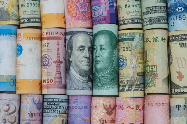 us dollar and china yuan banknote  with multi countries banknotes. its is symbol for tariff trade war crisis or unfair business of 2 biggest economic countries in the world. - finance usa despair government imagens e fotografias de stock