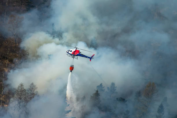 istock Helicopter extinguishing wildfire. Bergen, Norway. 1145440576