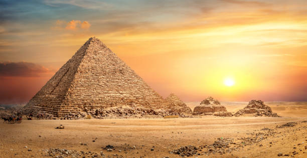 istock Egyptian pyramid in sand 1145447437