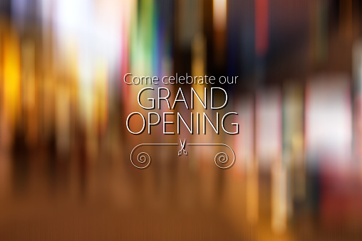 Image of Grand Opening Banner Design with Color Starburst Background.