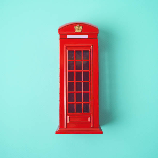 London red telephone booth on blue background. Top view from above