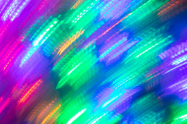 istock Abstract luminous seamless background of blurred diagonal  bright neon light. 1145453185