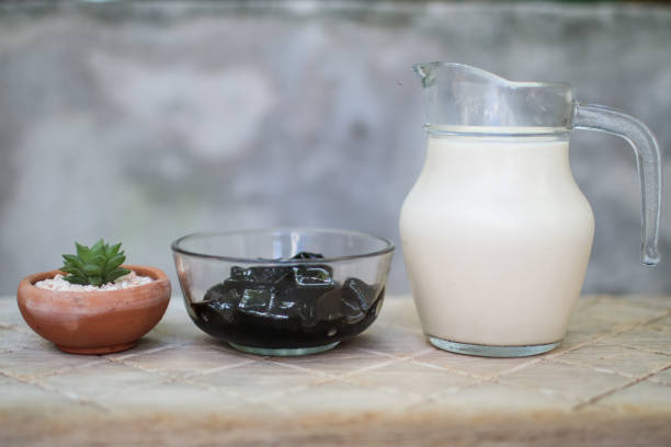 istock fresh milk with black grass jelly and cactus 1145454220