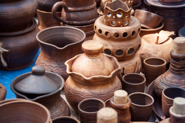 istock Clay pottery ceramic. Several types of clay pottery pots, cups, pitchers, teapots. 1145454645