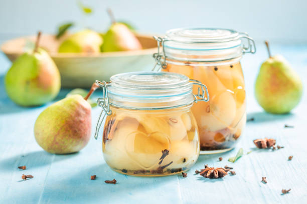istock Closeup of ingredients for fresh pickled pears on blue table 1145455610