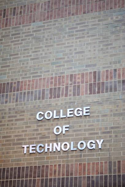 istock College of Technology sign on brick wall 1145462347