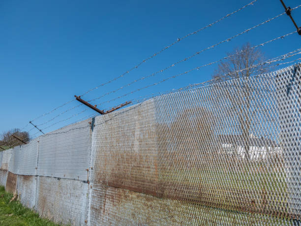 istock Border fence at a border 1145462388