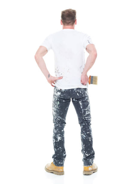 istock Handsome young white man who is a painter - hands on hips 1145466357