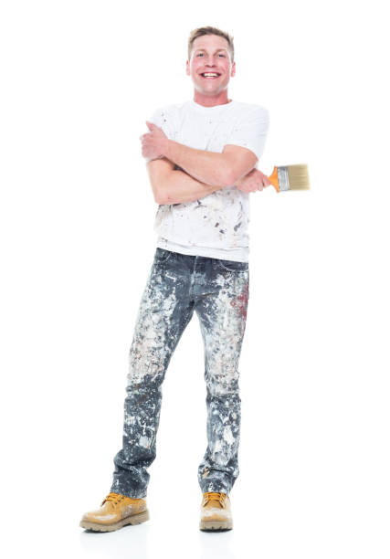 istock Handsome young white man who is a painter - arms crossed 1145466609
