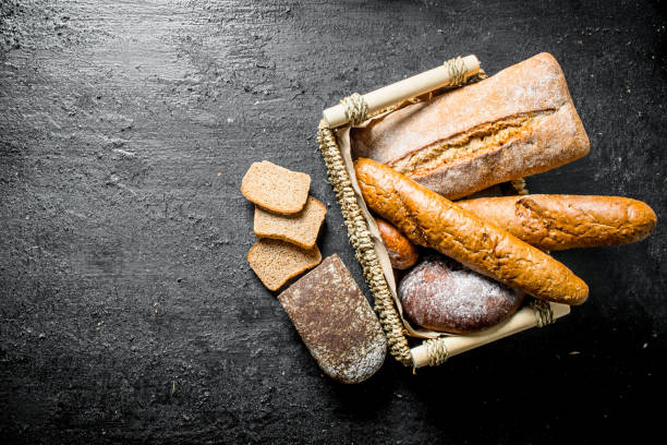 istock Different types of bread in the basket. 1145466700