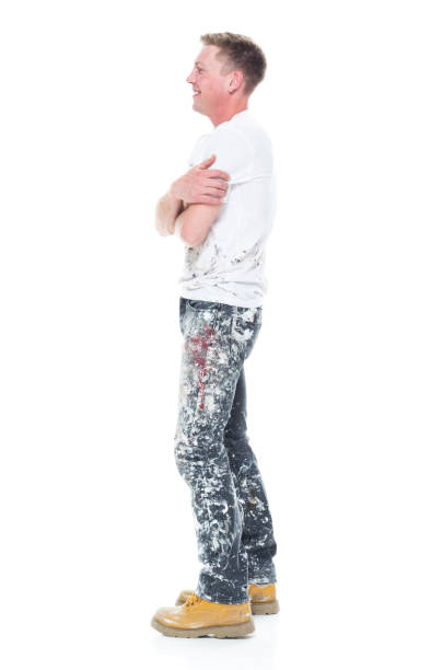 istock Handsome young white man who is a painter - arms crossed 1145467500