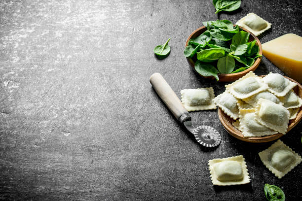 istock Ravioli raw with Parmesan and spinach. 1145467529