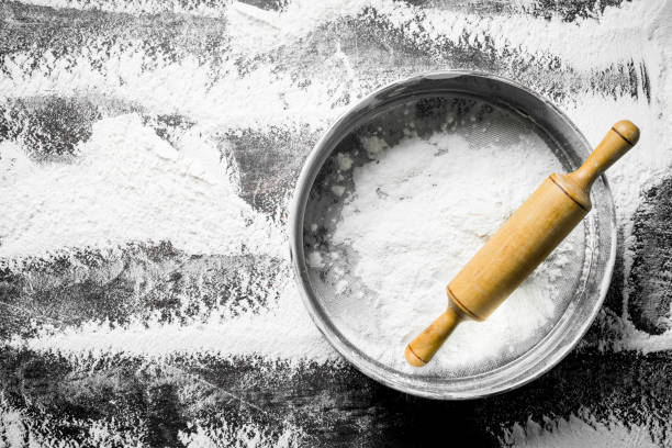 istock Flour with a sieve and a rolling pin. 1145469046