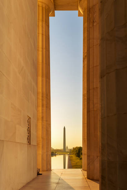 istock View of Washington Monument with Lincoln Memorial Architectural Column in foreground 1145469713