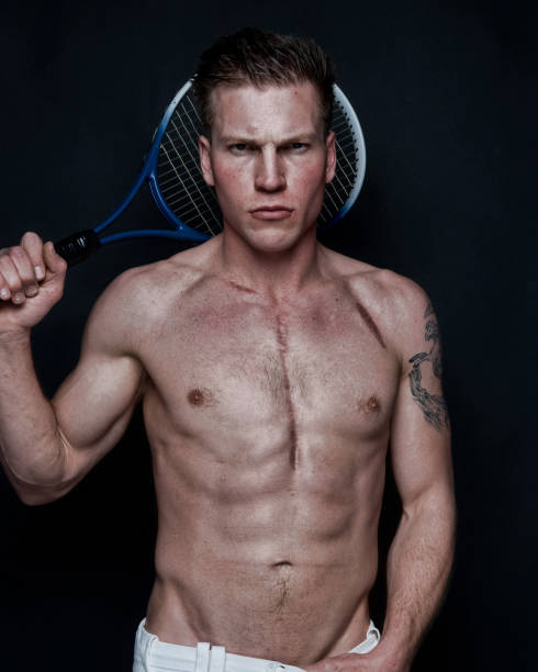 istock Sexy male tennis player 1145470656