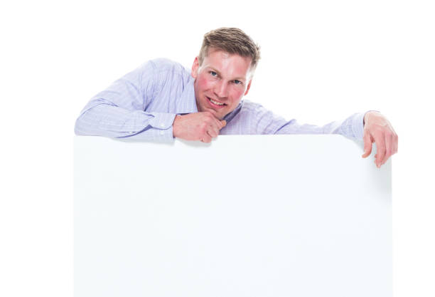 istock Young attractive businessman on white background - resting on top 1145471462