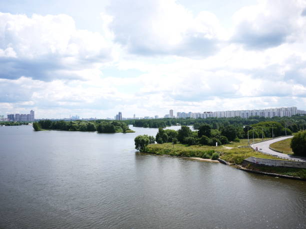 istock River flowing in the city. 1145472321