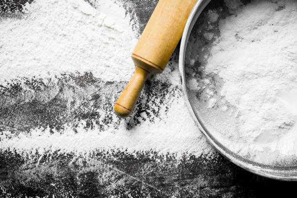istock Flour with a sieve and a rolling pin. 1145476237