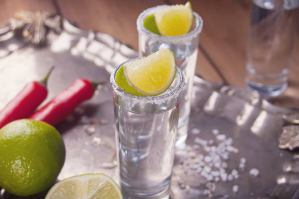istock Tequila shot with lime and sea salt on tray 1145477907