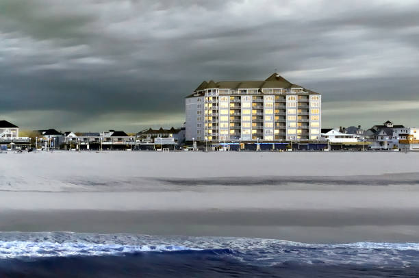 Ocean city hotel and beach shot using IR on an overcast spring morning to render a retro appearance and sense of both foreboding and hope