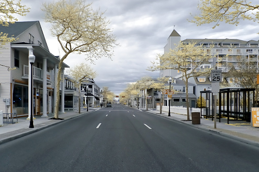 South Baltimore street in Ocean City, maryland on an overcast spring morning shot using an IR camera that renders images with a bit of a retro appearance and softens the architecture