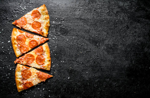 istock Sliced pepperonis pizza with cheese and salami. 1145480198