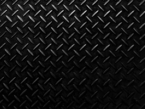 istock Dark black metal plate with pattern of anti slip 1145481271