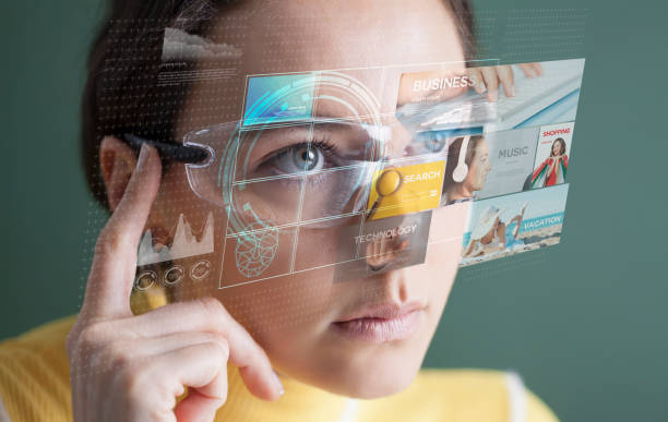 istock Woman in glasses with virtual screen 1145481332