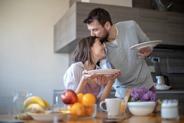 istock Young couple with vegan breakfast in dining room 1145482917