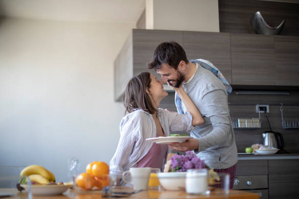 istock Young couple with vegan breakfast in dining room 1145482921