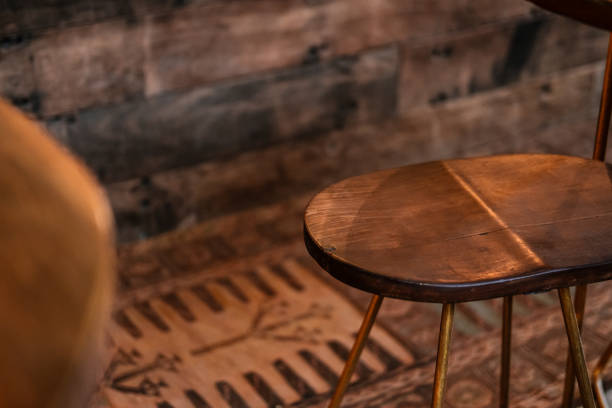 istock Rustic wood and bronze metal bar stool 1145488449
