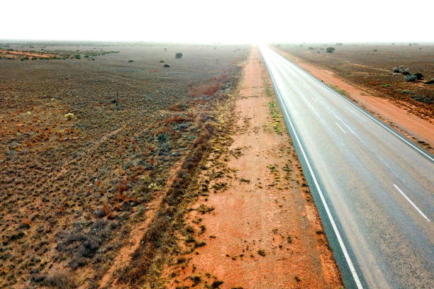 istock Long straight highway across the Australian outback 1145489332