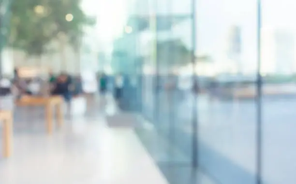 Photo of Blurred abstract glass wall from building in city town