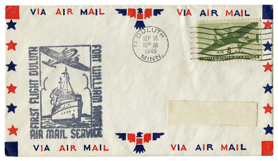 Duluth, Minnesota, the USA - 16 september 1946: US historical envelope: cover with cachet first flight duluth Fort William route and green postage stamp Air mail 8 cents,  postal cancellation