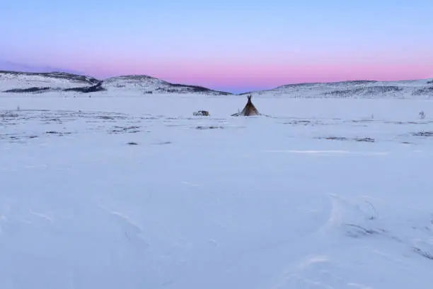 Sunset over nomad fisherman camp in the Arctic tundra. Polar Ural.Russia