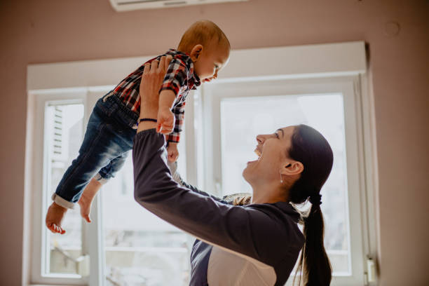 istock Mother holding beautiful baby boy 1145494441