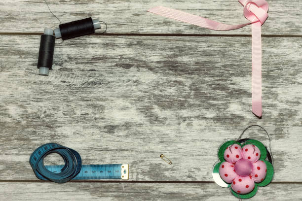 istock Buttons, ribbon , thread and needles for sewing 1145494991