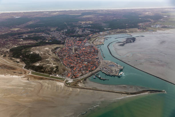 istock Aerial view Dutch harbor and Village Terschelling 1145496201