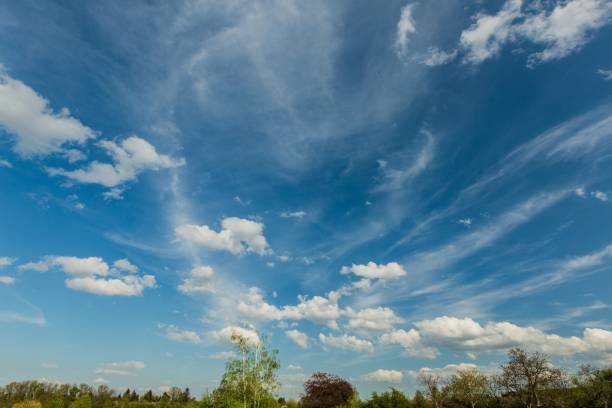 istock View of bright blue sky with white cumulus clouds. 1145502416