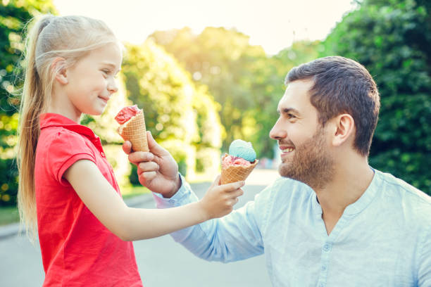 istock Father and daughter walk outdoors family time 1145508253