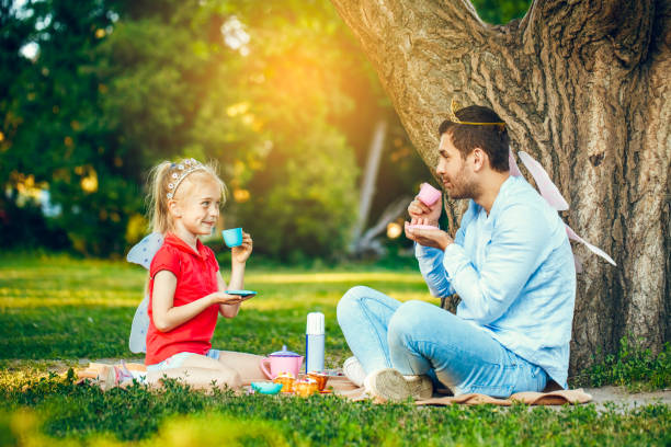 istock Father and daughter walk outdoors family time 1145508257