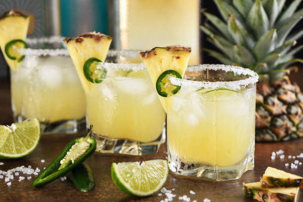 Alcoholic cocktail Pineapple Margarita, tequila with lime and jalapeno stock photo