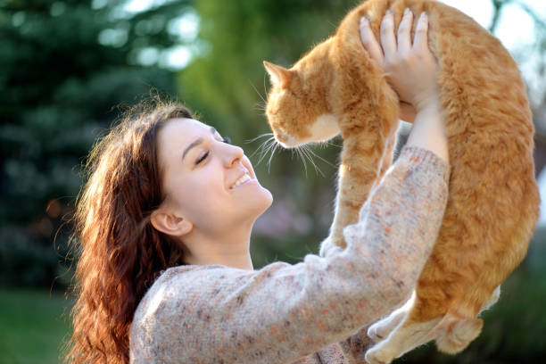 istock Woman and Cat ( summer) 1145508966