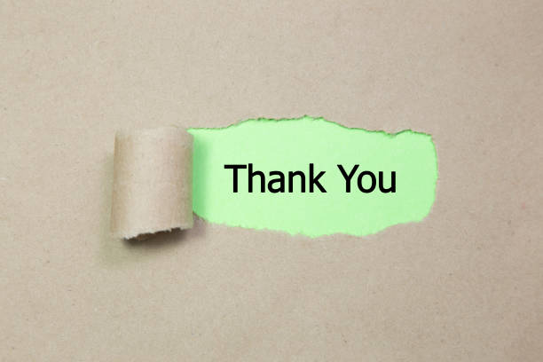 istock thank you word under torn paper 1145518953