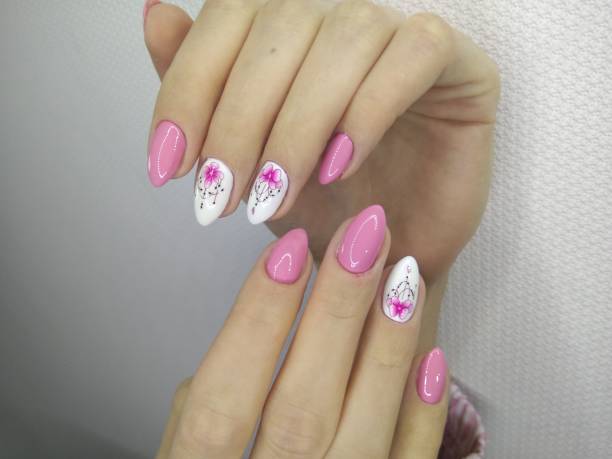 istock stylish design of manicure on long beautiful nails 1145524591