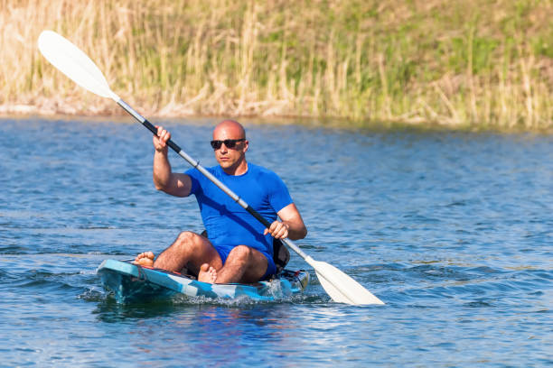 istock Young Man Kayaking on Lake. Lake Kayaking. 1145525539