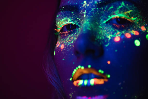 istock Young woman with fluorescent makeup 1145526541