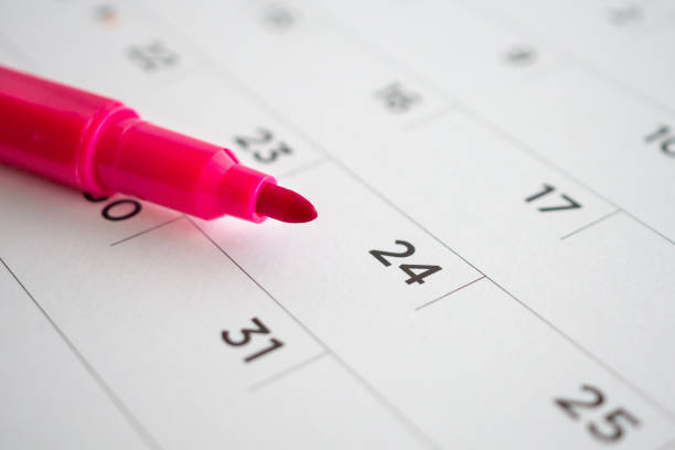 istock calendar page with red pen close up 1145532347