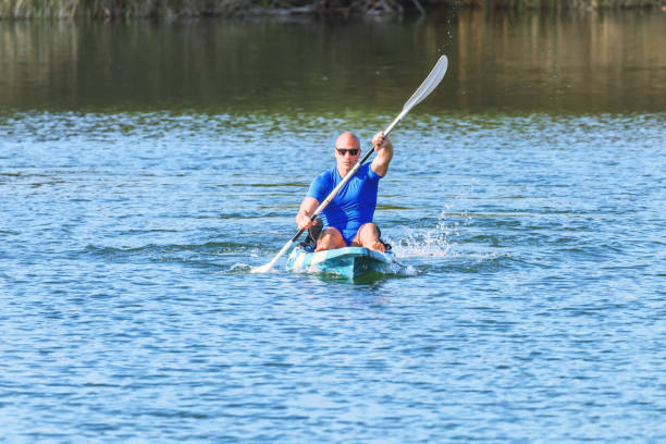 istock Young Man Kayaking on Lake. Lake Kayaking. 1145532787