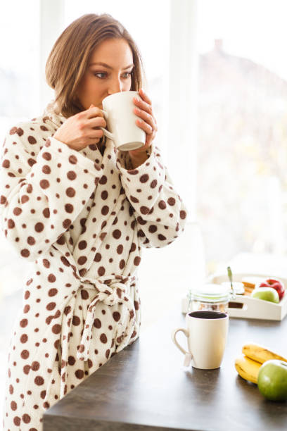 istock Young woman enjoying tea 1145533372